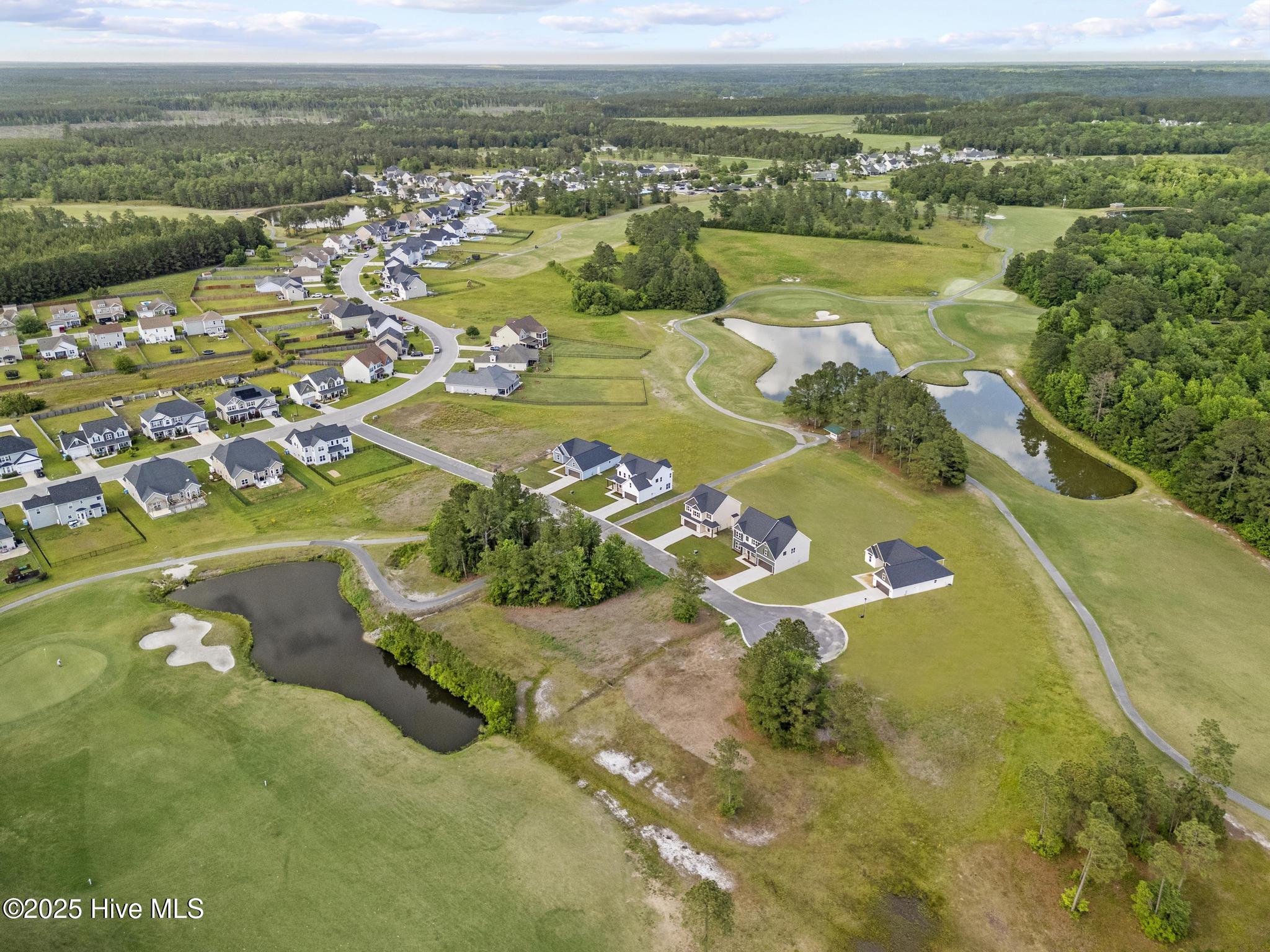 409 Fore Place Maple Hill, NC 28454 - Photo 4 of 43 DJI_20250506171039_0695_D