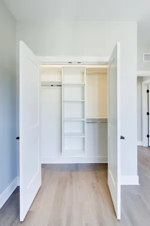 a view of an empty walk in closet