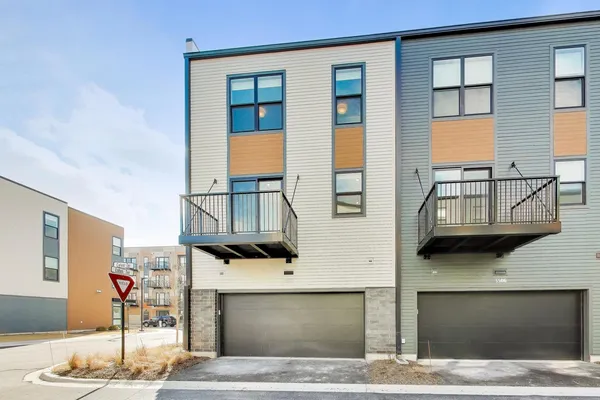 a living room with fireplace furniture and a window