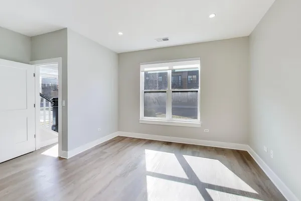 a living room with fireplace furniture and a flat screen tv