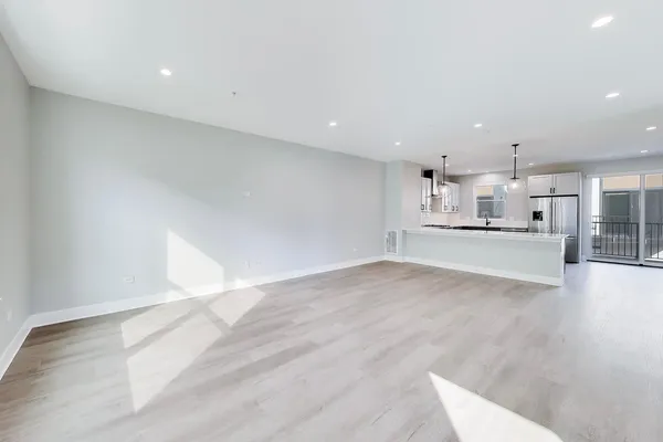 a view of a kitchen with a sink