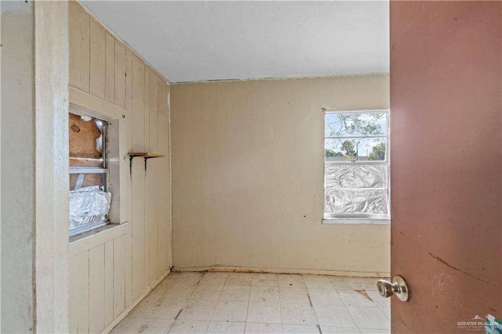 706 Doherty Avenue Mission, TX 78572 - Photo 12 of 21 a view of room with window and hallway
