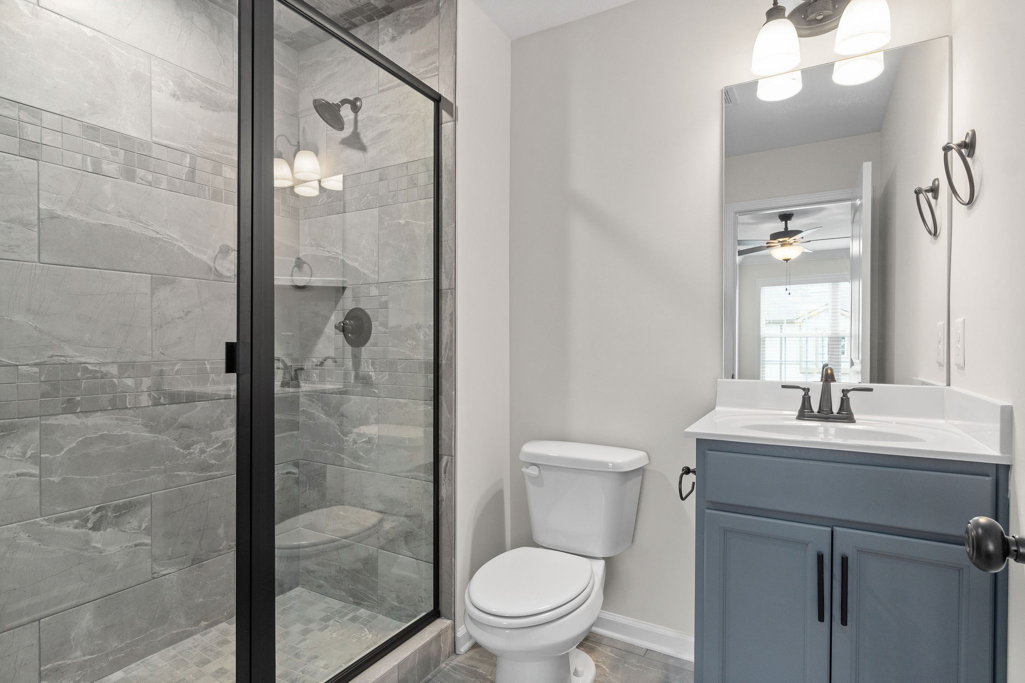 3350 Allen Road, Unit 1F Clarksville, TN 37042 - Photo 11 of 28 a bathroom with a toilet a sink and shower