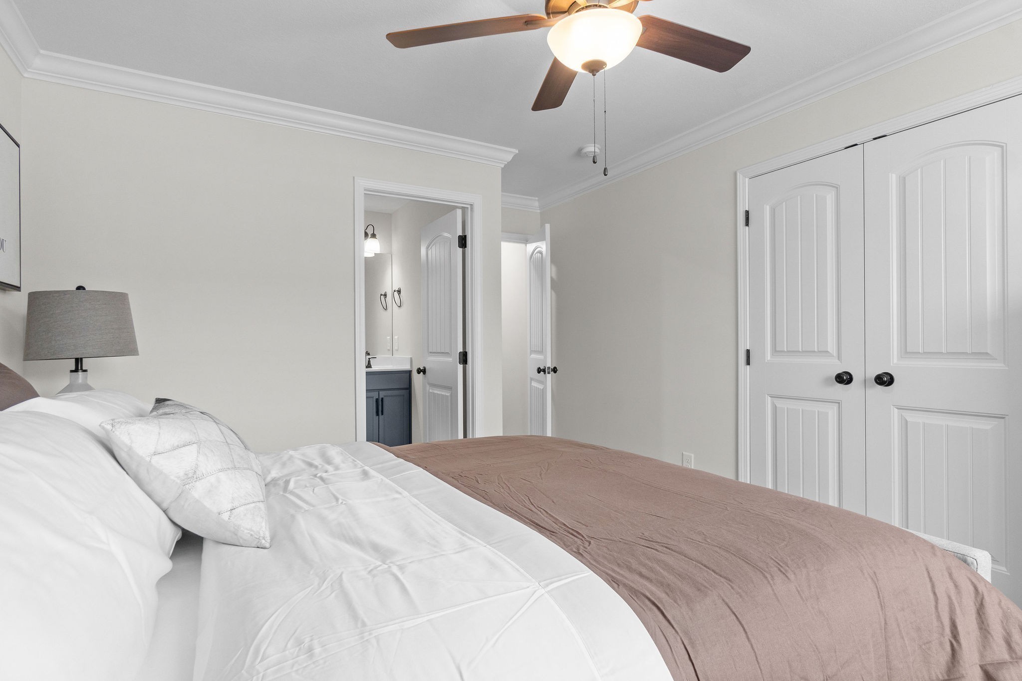 3350 Allen Road, Unit 1F Clarksville, TN 37042 - Photo 20 of 28 a bedroom with a large bed and a chandelier