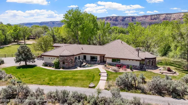 an aerial view of a house with garden