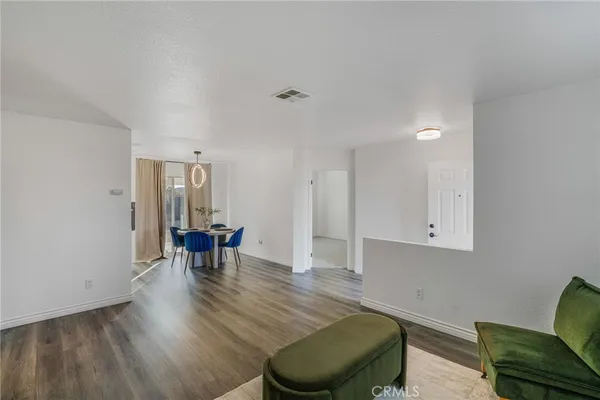 a room with furniture and a chair