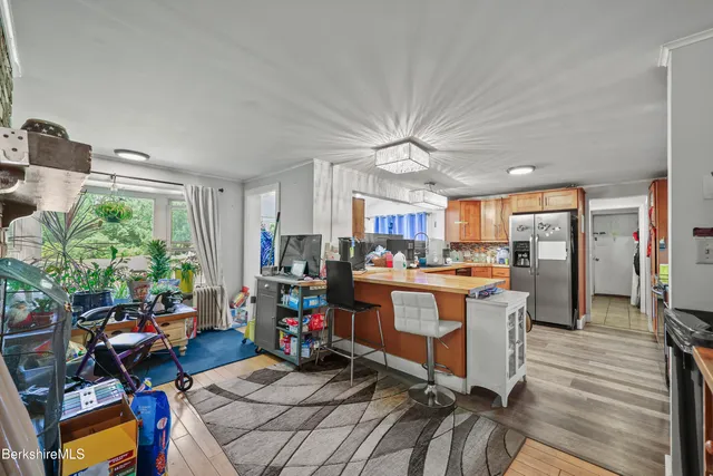 a view of a living room and dining room