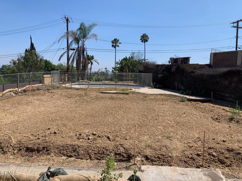 a view of a backyard of a house