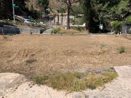 a view of a yard with an outdoor space