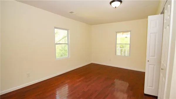 an empty room with windows