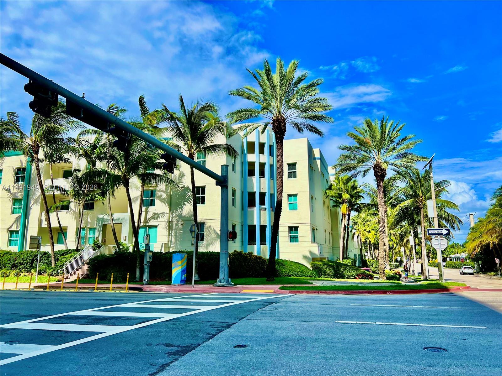 9172 Collins Avenue, Unit 305 Surfside, FL 33154 - Photo 33 of 37 a view of a palm trees in a yard