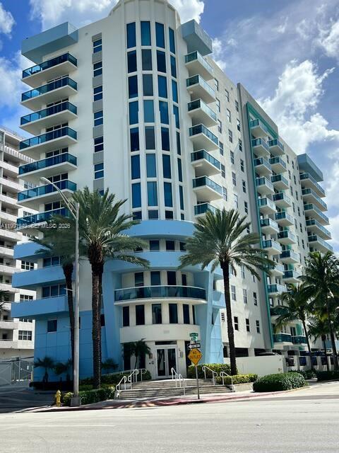 9172 Collins Avenue, Unit 305 Surfside, FL 33154 - Photo 34 of 37 a front view of a multi story building