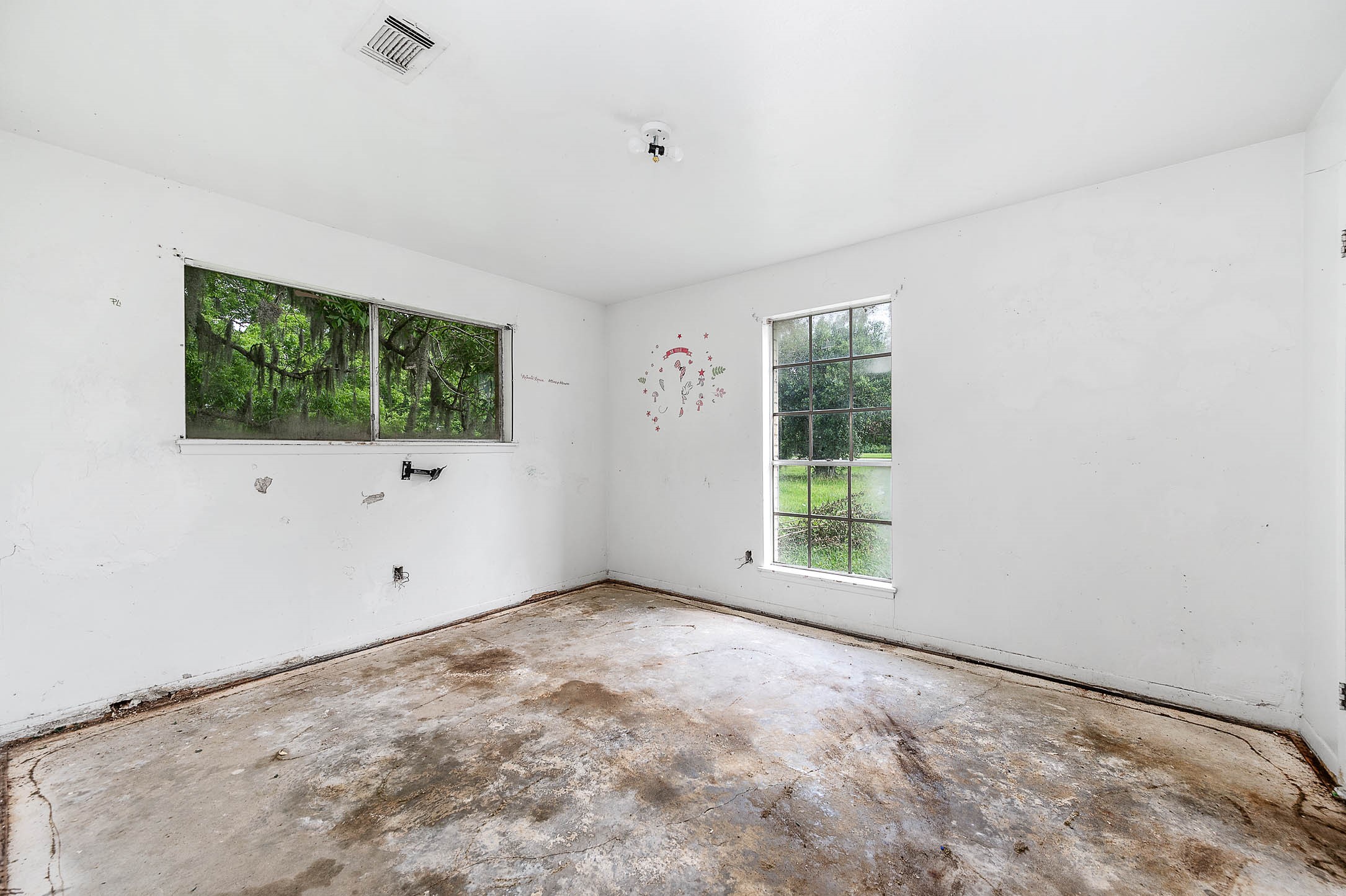 2719 Farm To Market 524 Road Sweeny, TX 77480 - Photo 17 of 20 a view of an empty room with a window