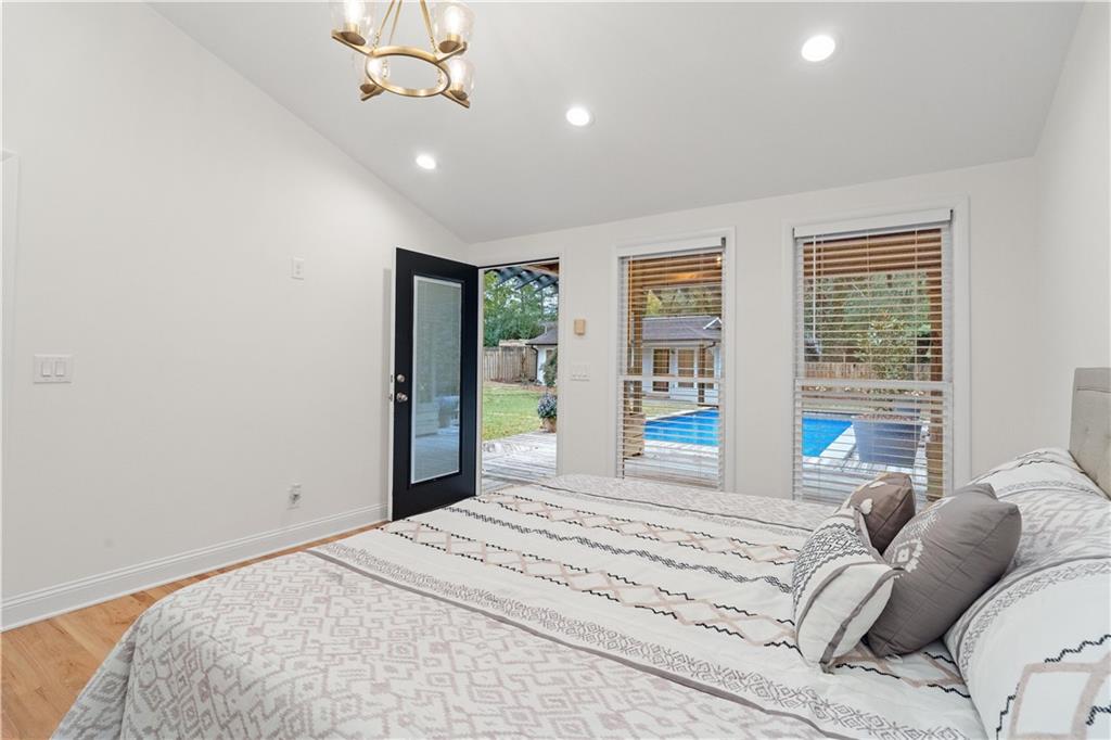 511 Boulevard Heights Calhoun, GA 30701 - Photo 24 of 69 a bedroom with a large bed and a large window