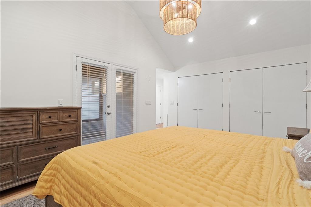 511 Boulevard Heights Calhoun, GA 30701 - Photo 34 of 69 a bedroom with a bed and cabinets