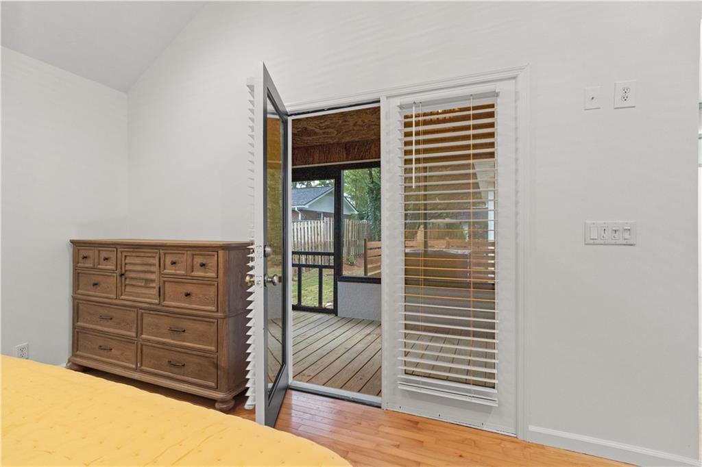 511 Boulevard Heights Calhoun, GA 30701 - Photo 35 of 69 a view of a bedroom with a furniture and wooden floor