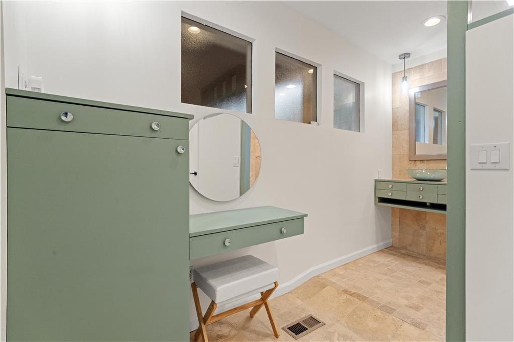 511 Boulevard Heights Calhoun, GA 30701 - Photo 37 of 69 a bathroom with a sink a mirror and shower