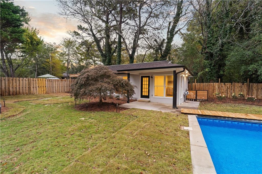 511 Boulevard Heights Calhoun, GA 30701 - Photo 42 of 69 a house view with a garden space