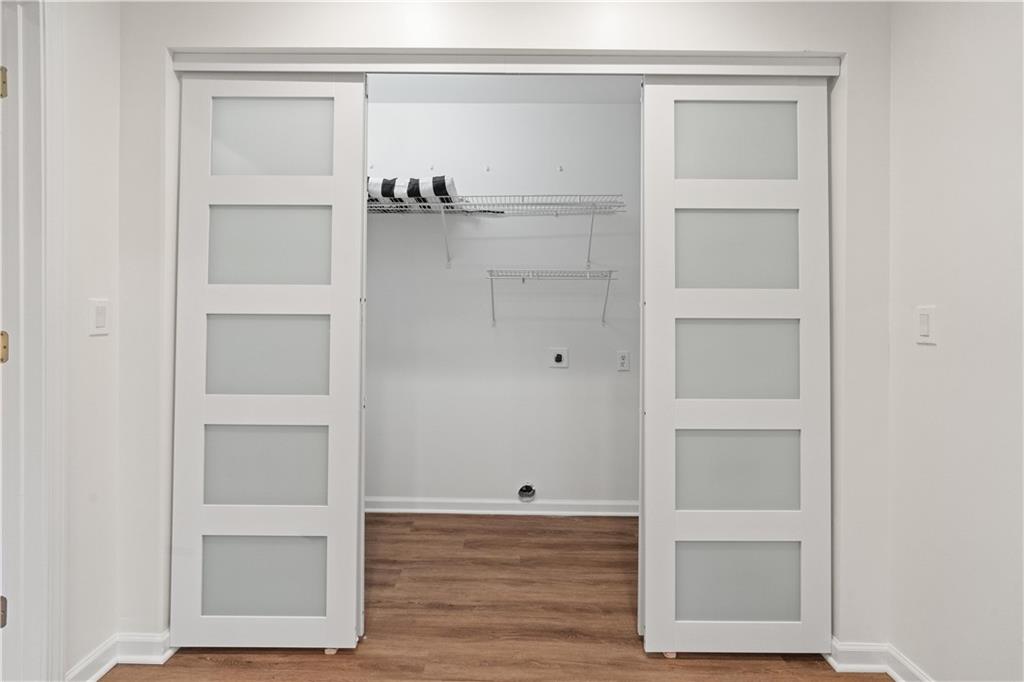 511 Boulevard Heights Calhoun, GA 30701 - Photo 49 of 69 a view of walk in closet with empty racks