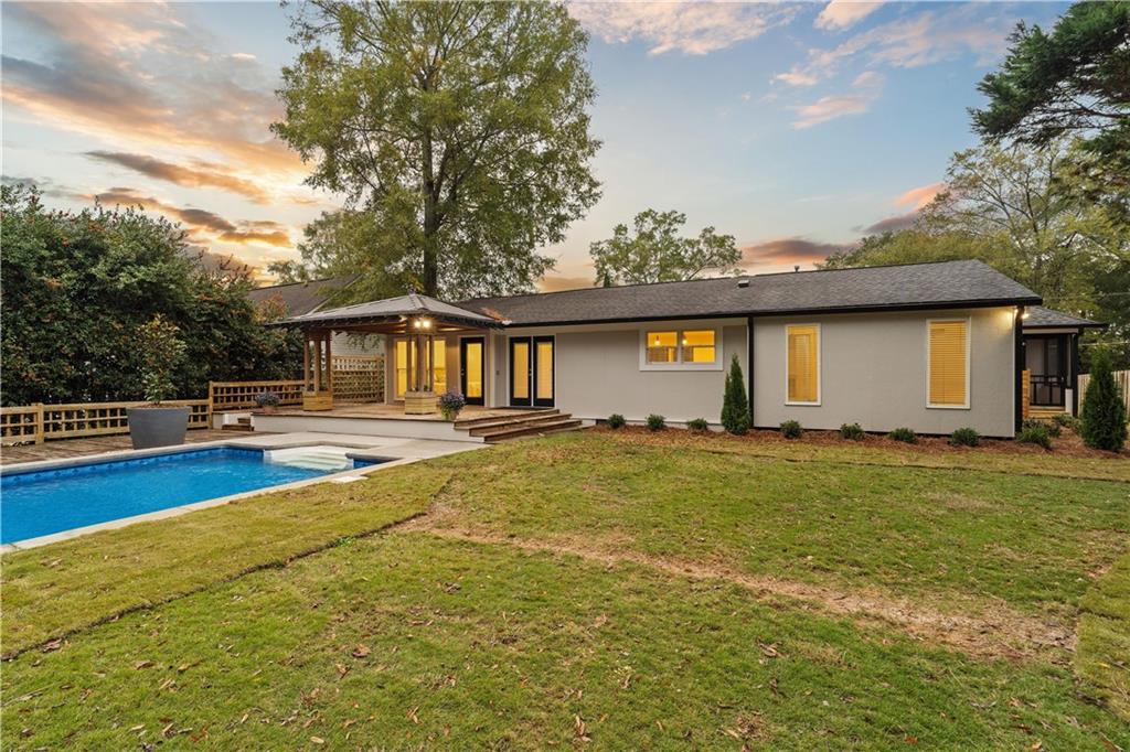 511 Boulevard Heights Calhoun, GA 30701 - Photo 5 of 69 a front view of house with yard and swimming pool