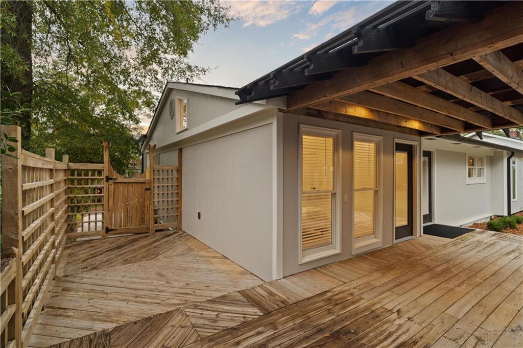 511 Boulevard Heights Calhoun, GA 30701 - Photo 54 of 69 a view of backyard with small cabin and wooden fence