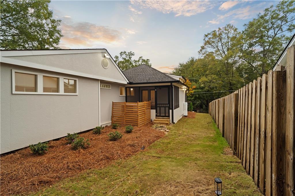 511 Boulevard Heights Calhoun, GA 30701 - Photo 6 of 69 a backyard of a house with table and chairs