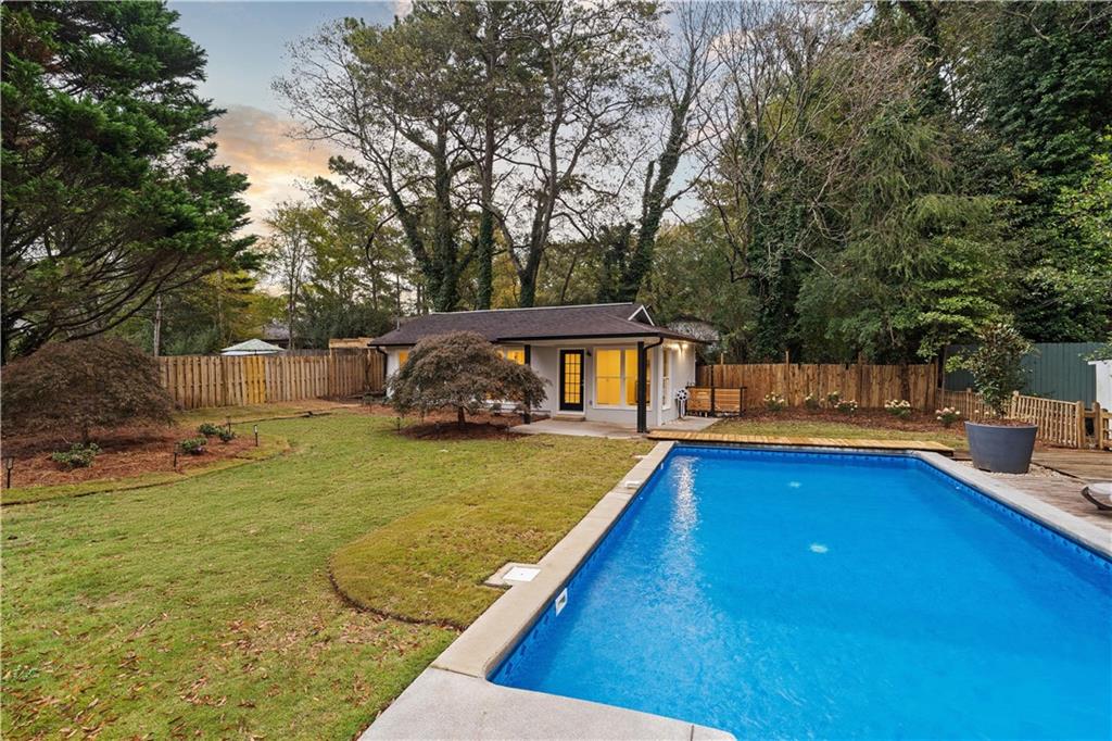 511 Boulevard Heights Calhoun, GA 30701 - Photo 8 of 69 a view of a house with swimming pool and sitting area