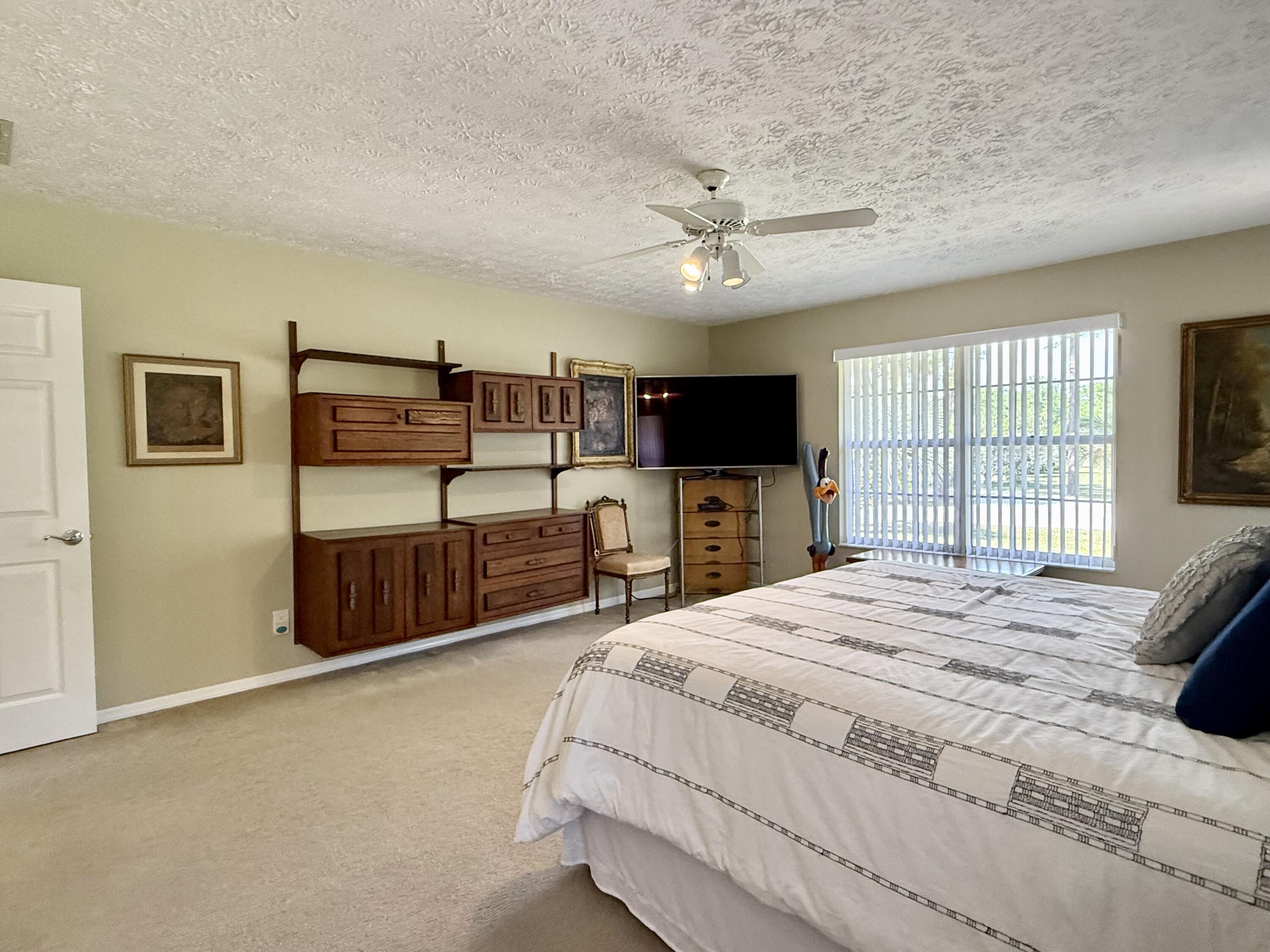 2884 Southeast Ranch Acres Circle Jupiter, FL 33478 - Photo 44 of 93 bedroom 1