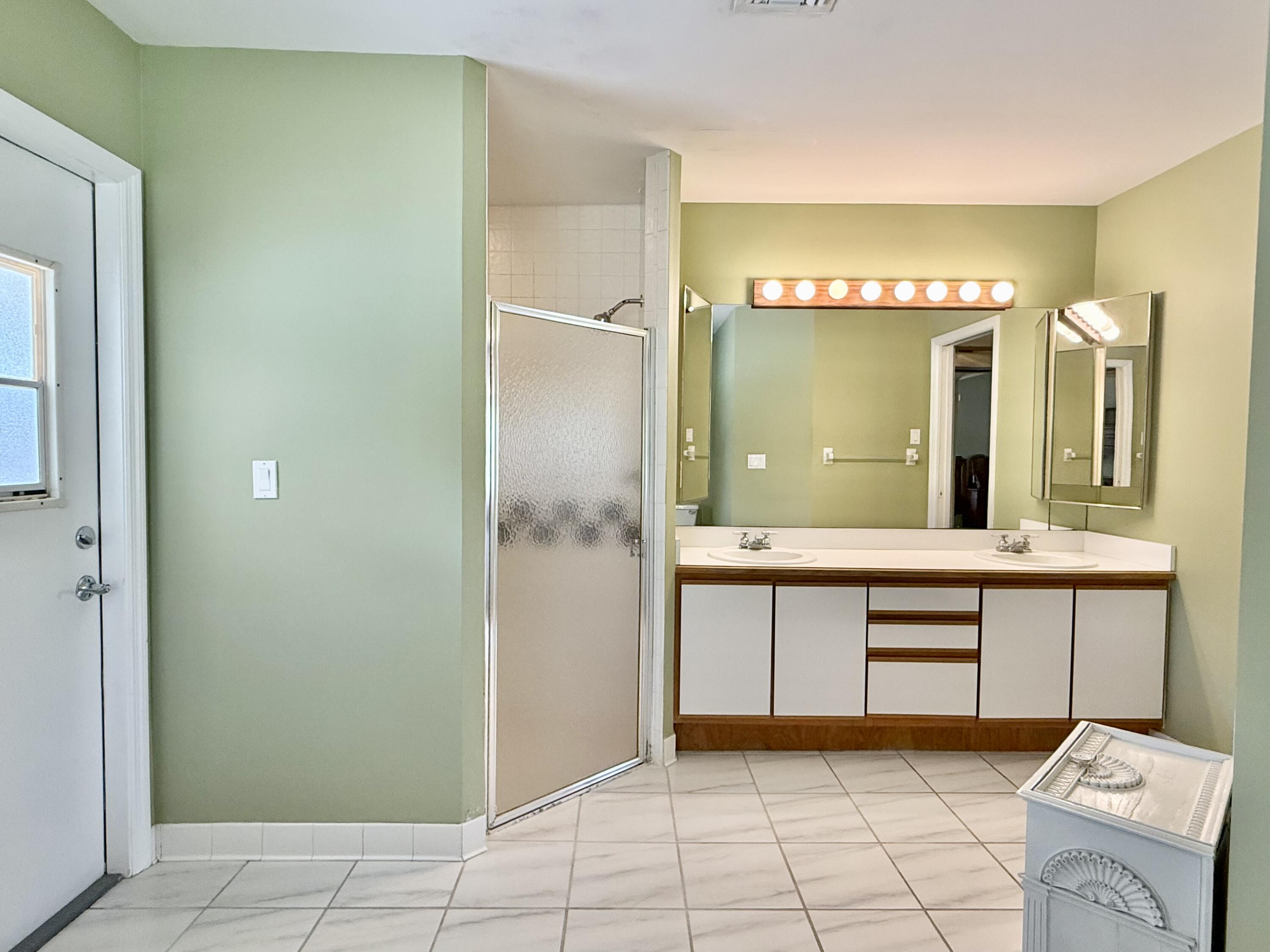 2884 Southeast Ranch Acres Circle Jupiter, FL 33478 - Photo 52 of 93 bathroom 1