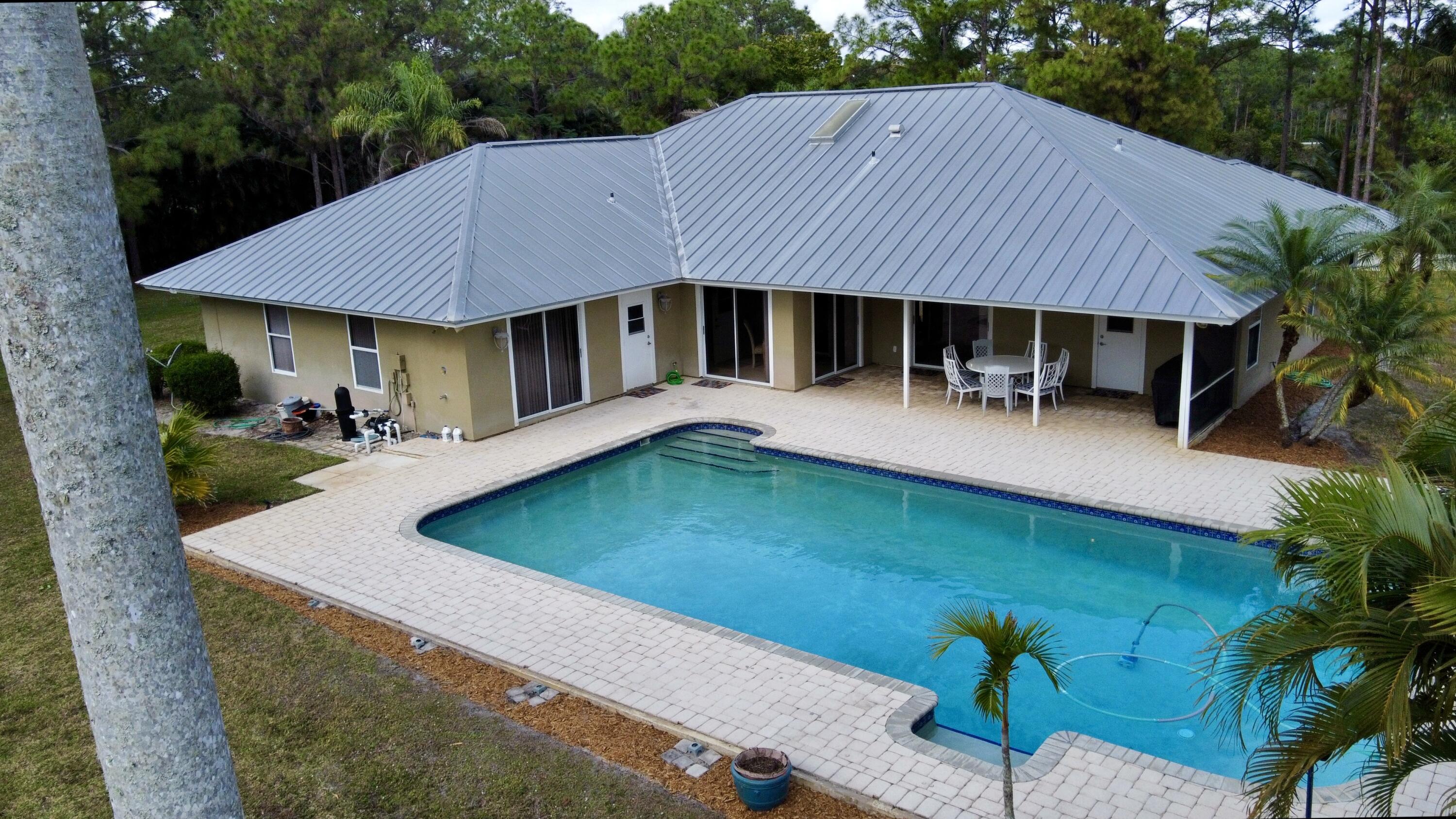 2884 Southeast Ranch Acres Circle Jupiter, FL 33478 - Photo 8 of 93 aerial pool