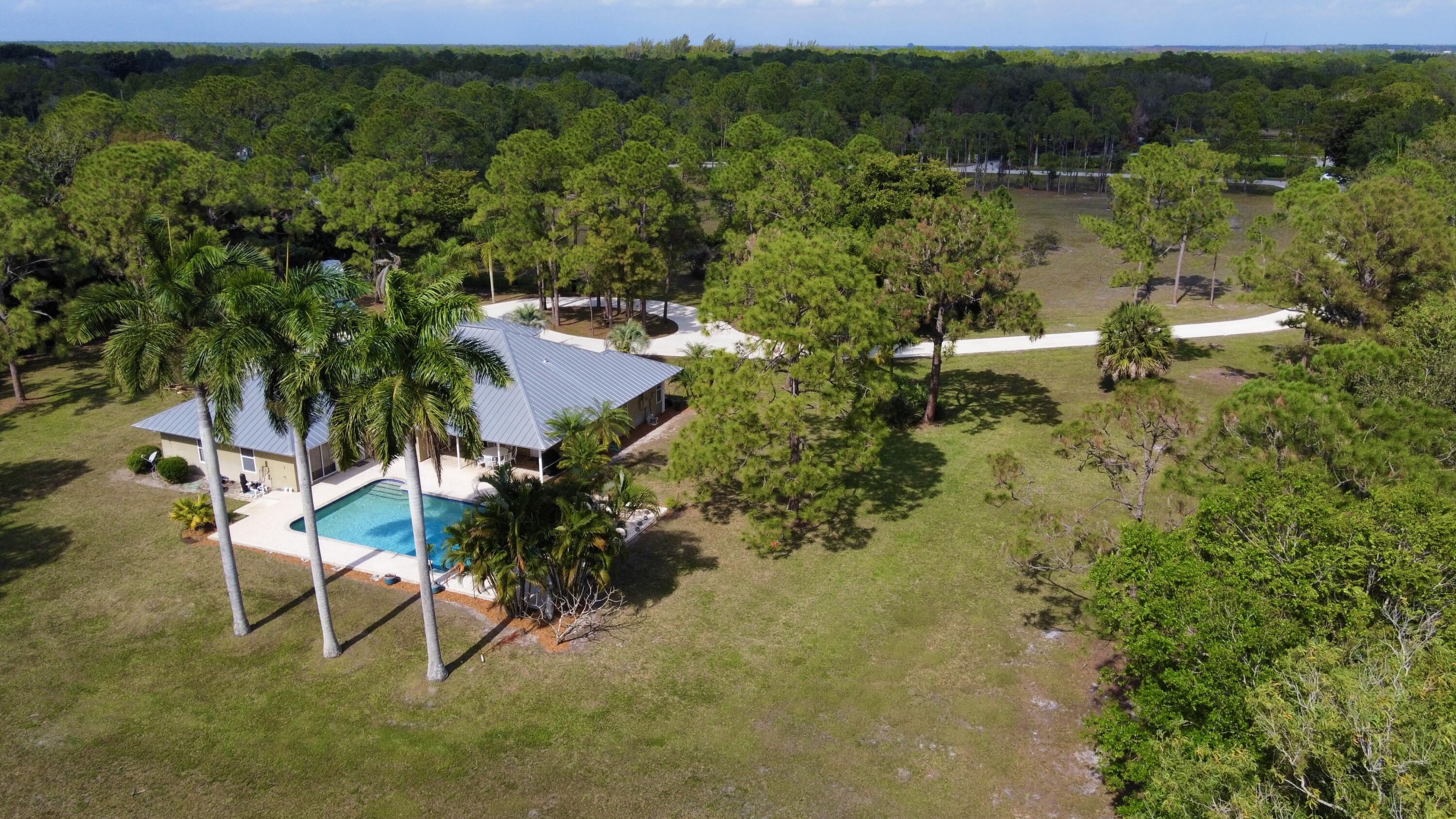 2884 Southeast Ranch Acres Circle Jupiter, FL 33478 - Photo 82 of 93 aerial back