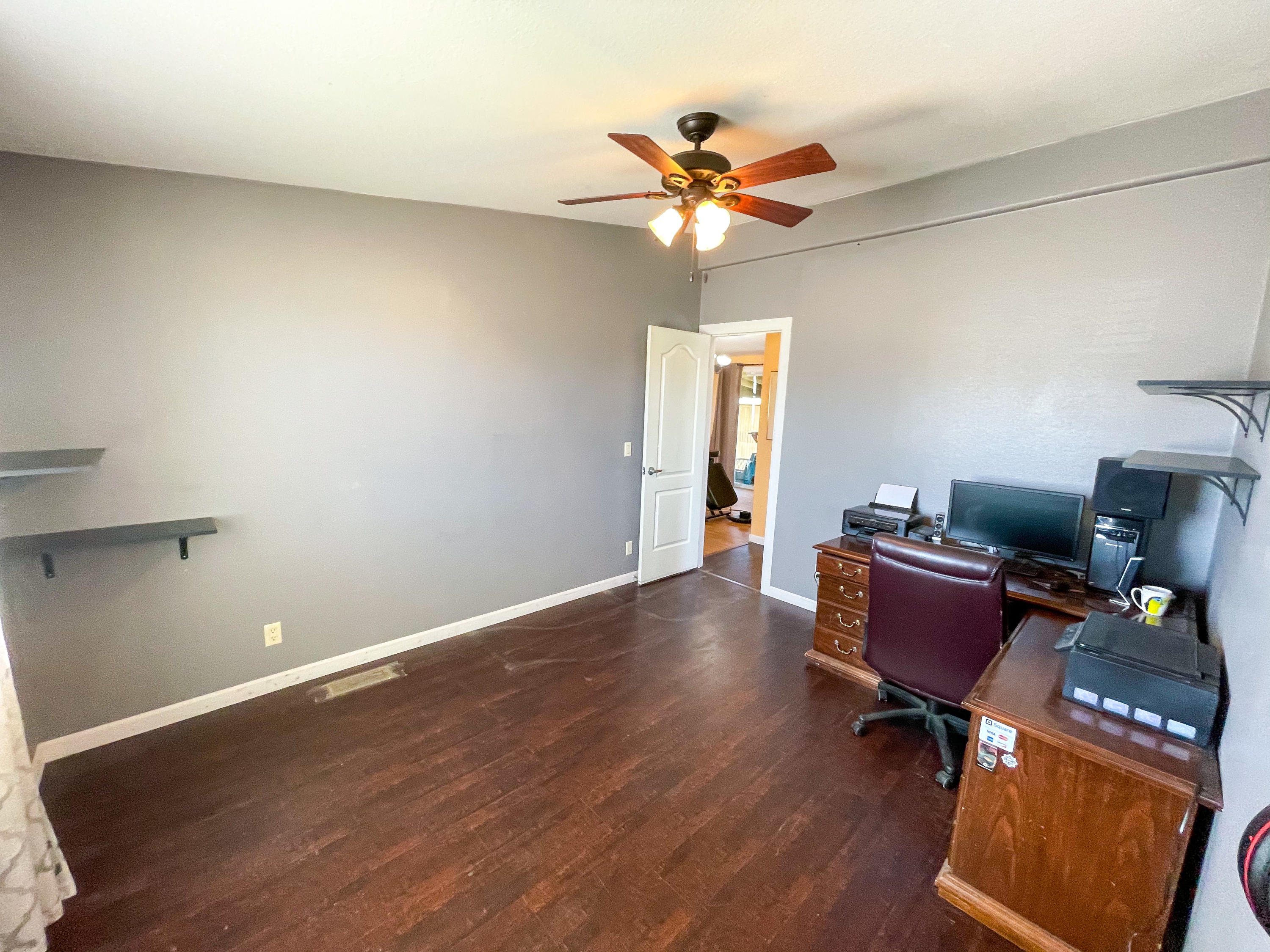 4647 Montiverde Road Mojave, CA 93501 - Photo 19 of 30 a view of workspace with wooden floor and ceiling fan