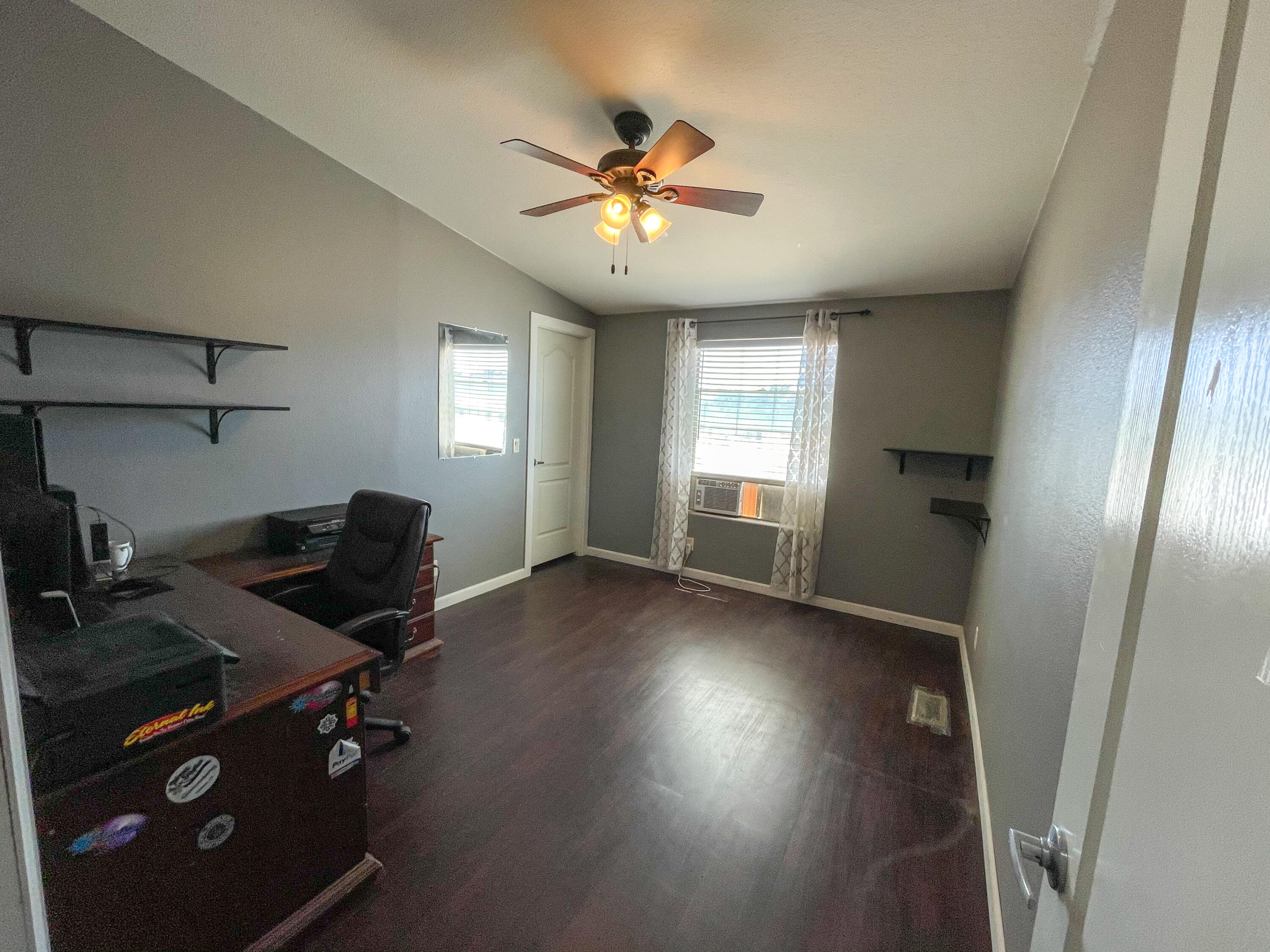 4647 Montiverde Road Mojave, CA 93501 - Photo 20 of 30 a workspace with wooden floor and windows