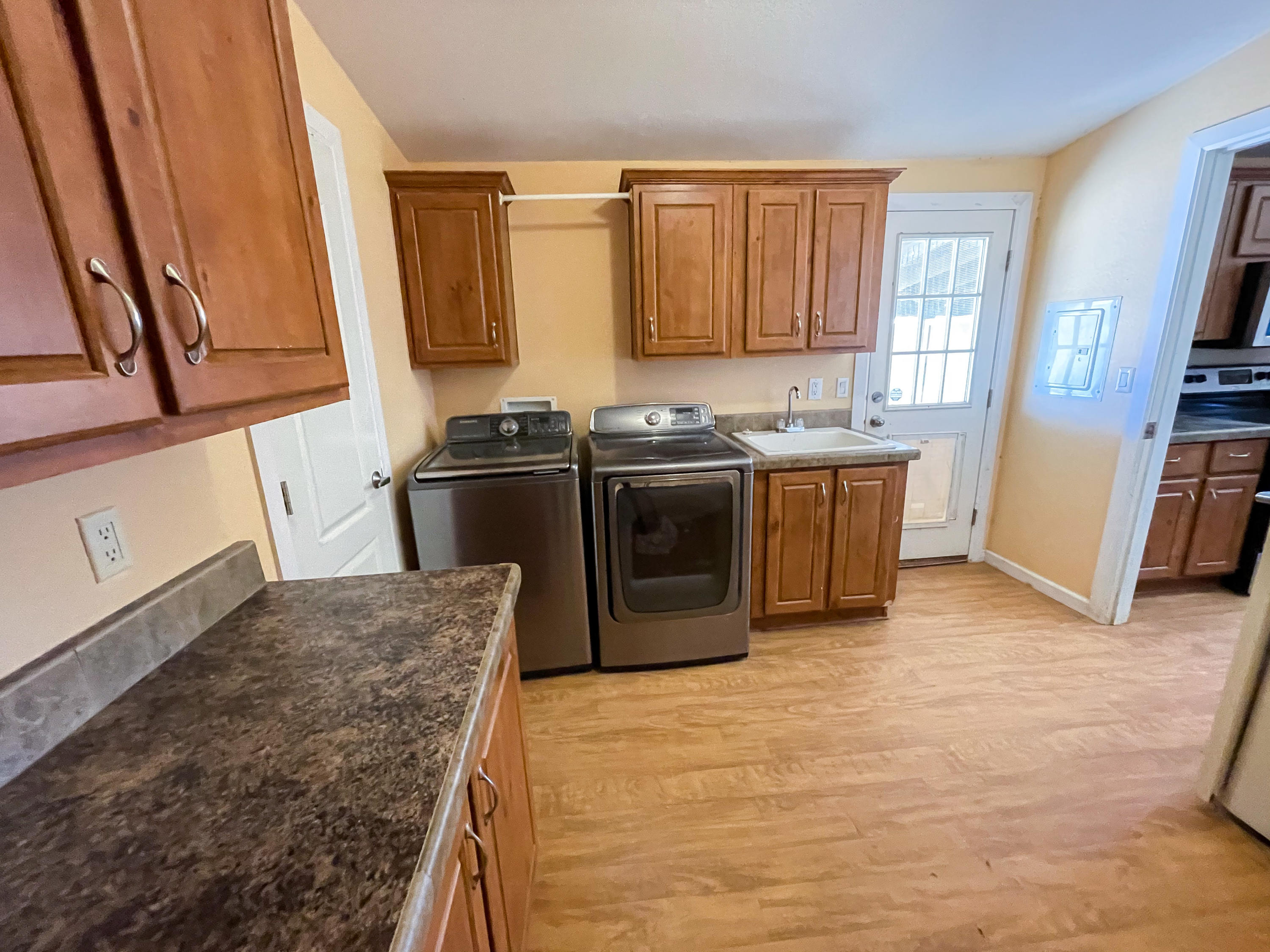 4647 Montiverde Road Mojave, CA 93501 - Photo 24 of 30 a kitchen with stainless steel appliances granite countertop a stove a sink and a refrigerator