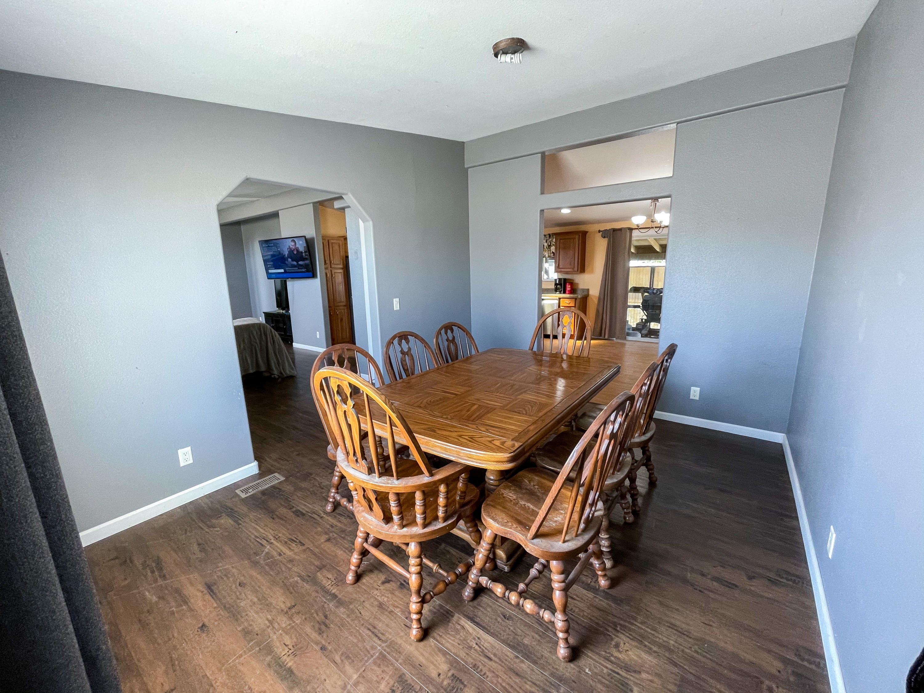 4647 Montiverde Road Mojave, CA 93501 - Photo 10 of 30 a view of a dining room with furniture and wooden floor