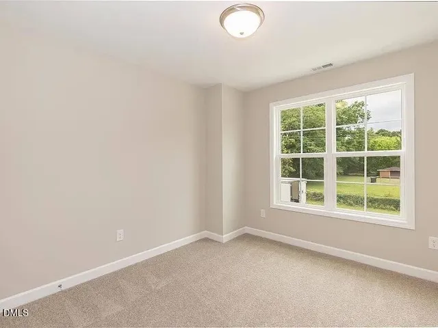 an empty room with a window