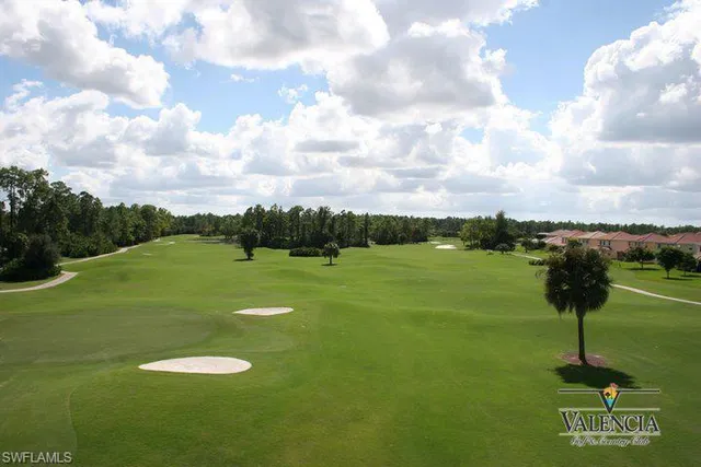 a view of a lake with a big yard