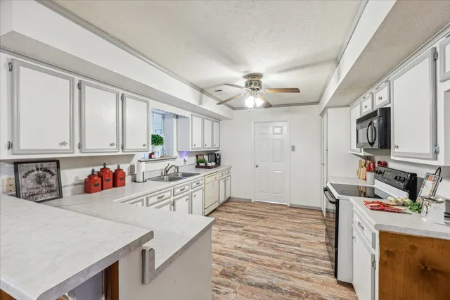 a very nice looking kitchen with a stove