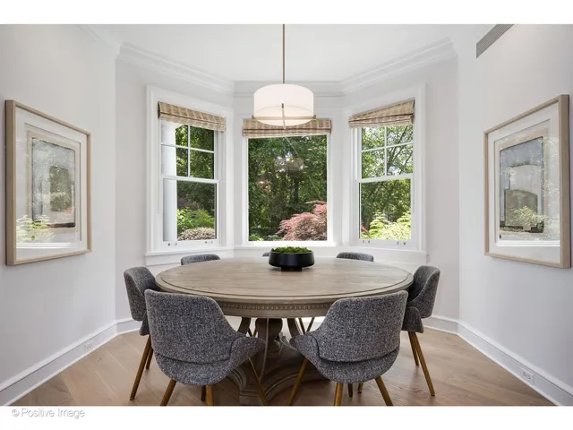 a view of an outdoor sitting area with furniture