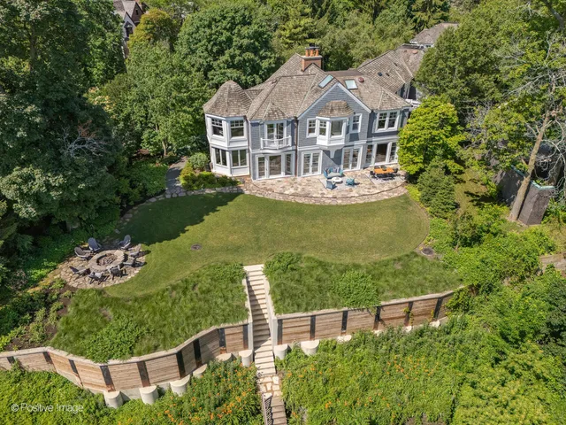 a view of a house with a flower garden
