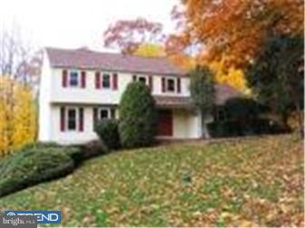 106 North Chapman Road Doylestown, PA 18901 - Photo 1 of 9 a front view of a house with a yard