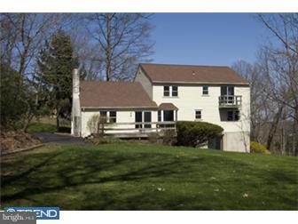 106 North Chapman Road Doylestown, PA 18901 - Photo 6 of 9 a view of a house with a yard