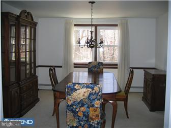 106 North Chapman Road Doylestown, PA 18901 - Photo 7 of 9 a view of a dining room with furniture and window