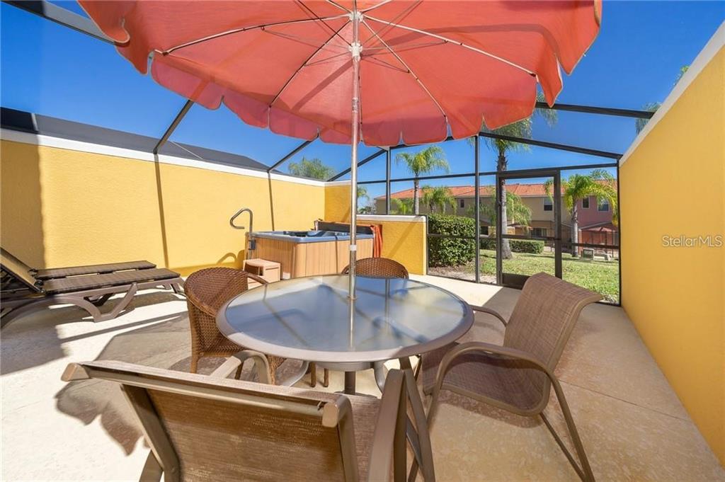 3007 White Orchid Road Kissimmee, FL 34747 - Photo 21 of 23 a outdoor view with a sitting space