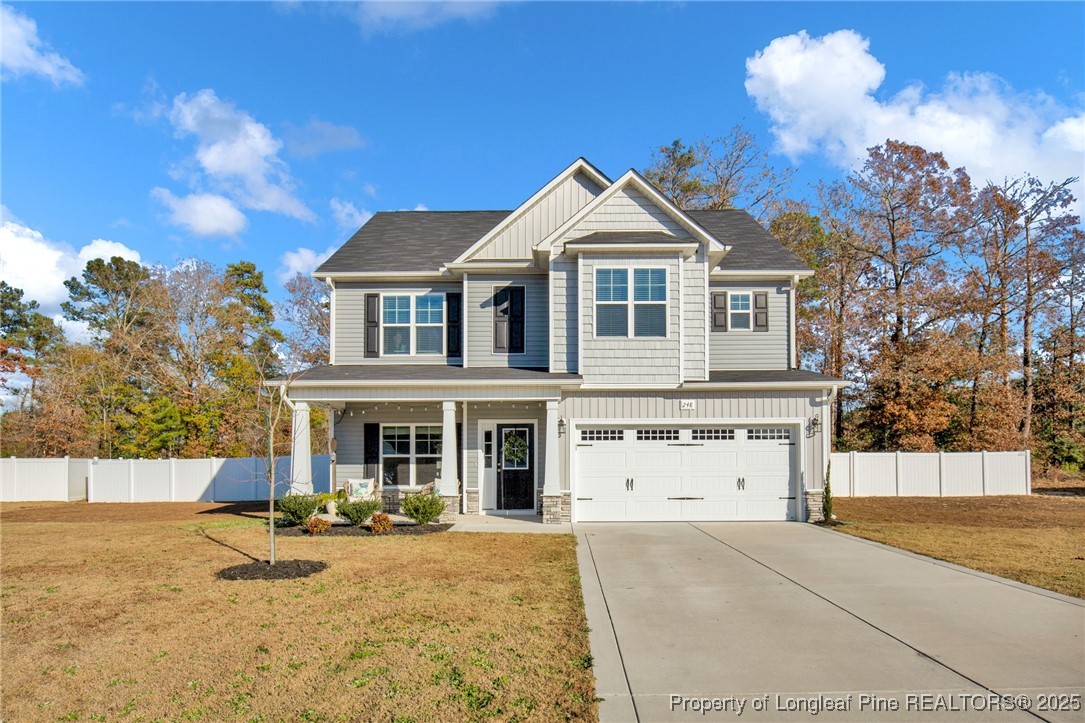 248 Rainy Beck Way Erwin, NC 28339 - Photo 1 of 44 a front view of a house with a yard