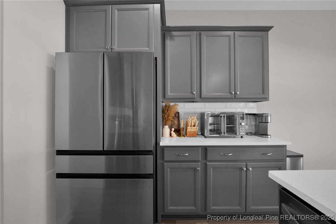 248 Rainy Beck Way Erwin, NC 28339 - Photo 17 of 44 a kitchen with appliances and cabinets