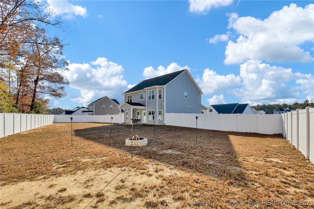 248 Rainy Beck Way Erwin, NC 28339 - Photo 41 of 44 a view of a house with a yard