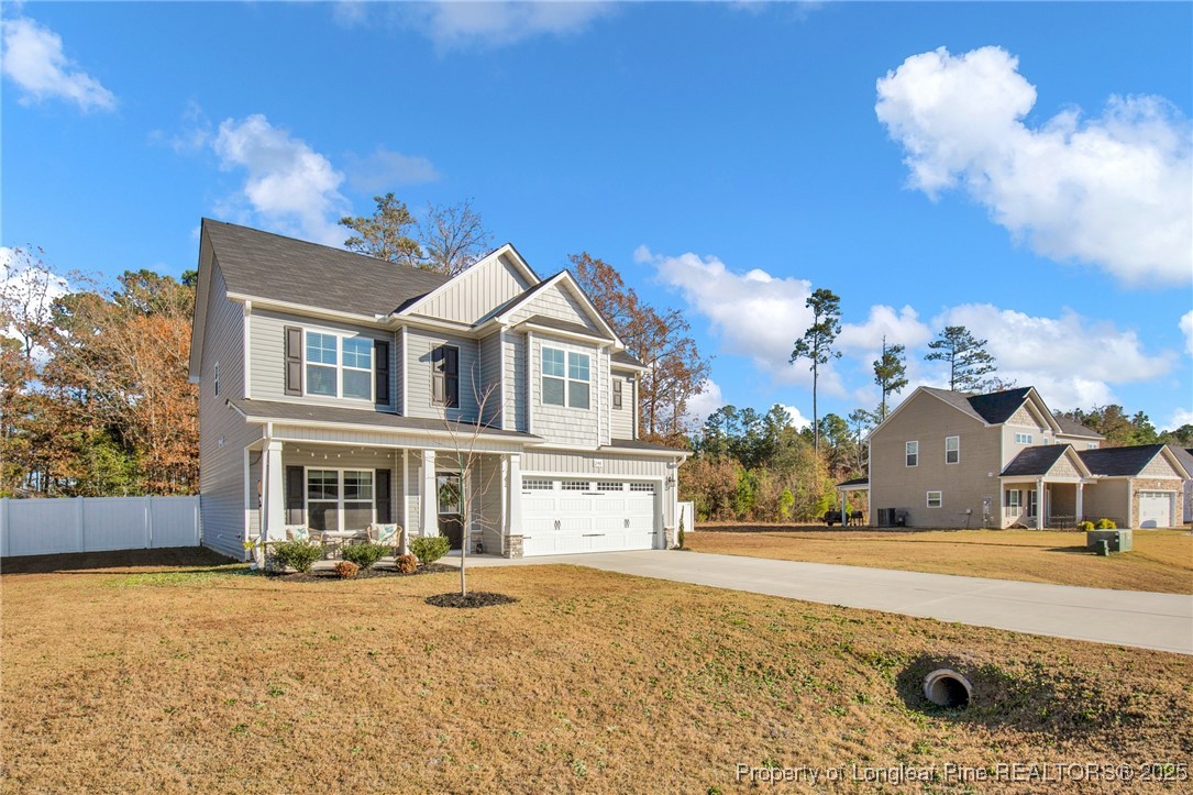 248 Rainy Beck Way Erwin, NC 28339 - Photo 44 of 44 a front view of a house with a yard