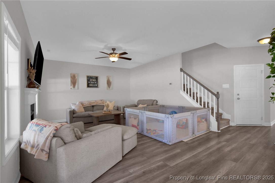 248 Rainy Beck Way Erwin, NC 28339 - Photo 8 of 44 a living room with furniture and a flat screen tv