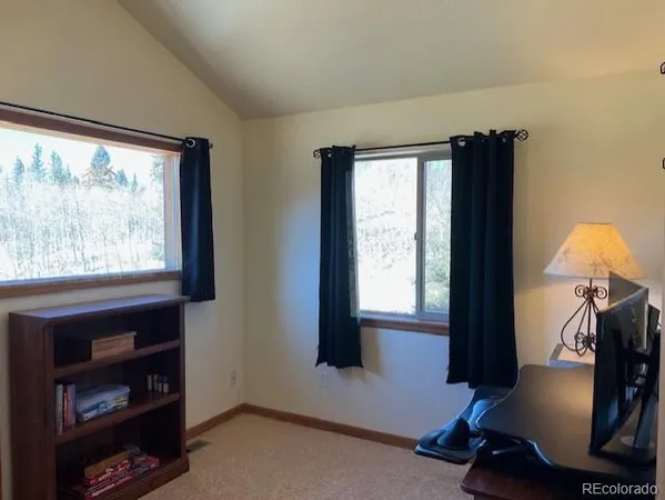 a room with furniture and a window